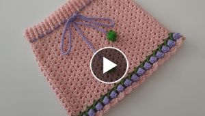 Making a knitted skirt with two needles.